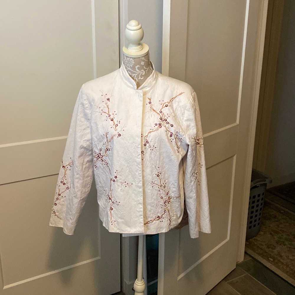 This is a gorgeous jacket that can be worn with just about anything.